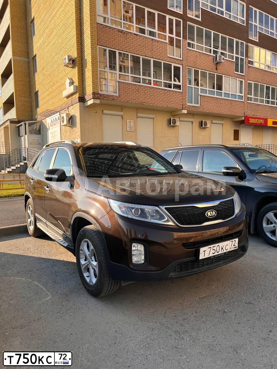 Фото автомобиля KIA SORENTO, 2014 — госномер Т750КС72. Цвет: КОРИЧНЕВЫЙ