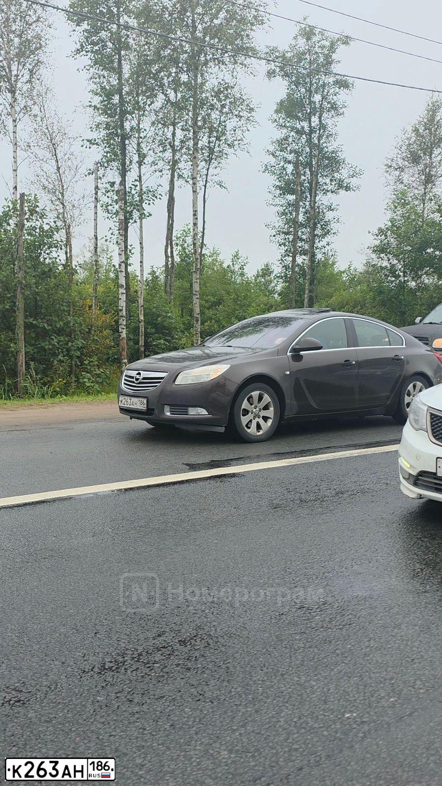 Фото автомобиля OPEL INSIGNIA, 2012 — госномер К263АН186. Цвет: Коричневый