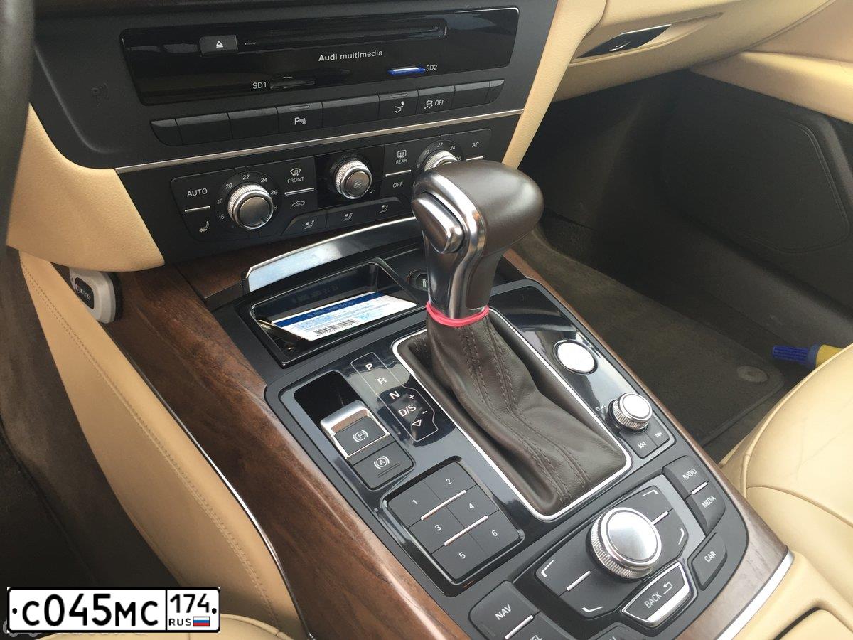 Фото автомобиля AUDI A7, 2015 — госномер С234МА774. Цвет: Красный