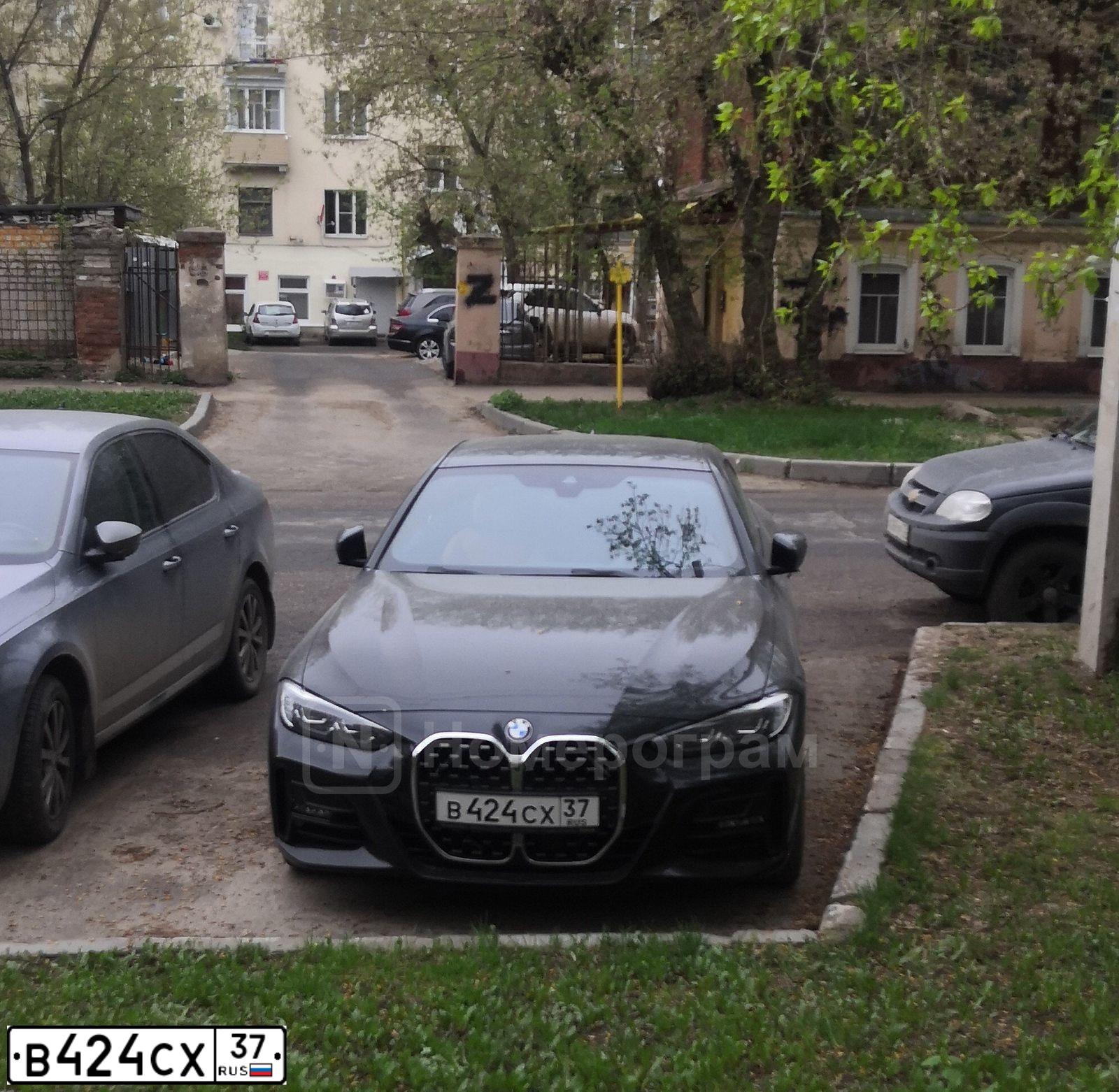 Фото автомобиля NISSAN QASHQAI, 2007 — госномер В424СХ37. Цвет: ОРАНЖЕВЫЙ