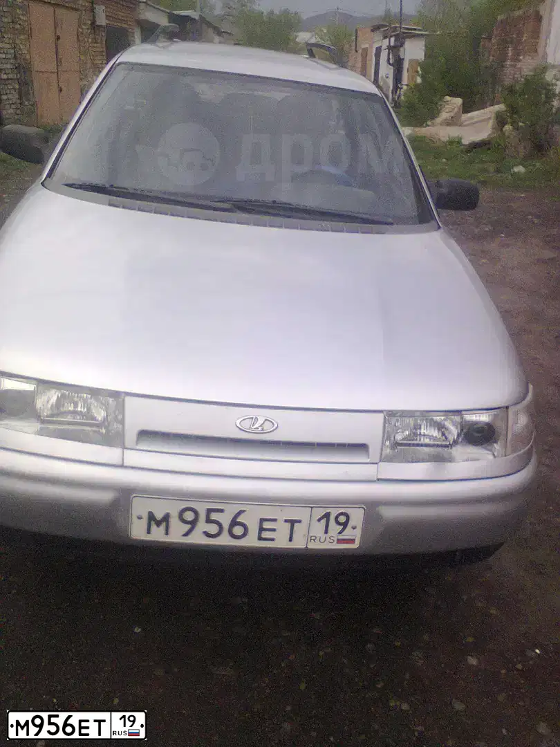 Фото автомобиля LADA 2111, 2002 — госномер М956ЕТ19. Цвет: СВЕТЛО-СЕРЕБРИСТЫЙ МЕТАЛЛ