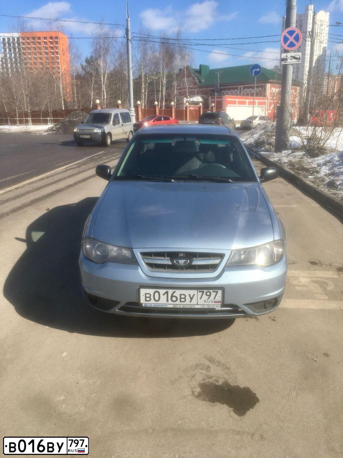 Фото автомобиля DAEWOO NEXIA, 2012 — госномер В016ВУ797. Цвет: Серо-голубой