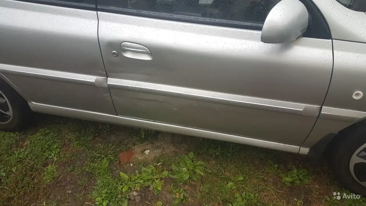 Фото автомобиля KIA RIO, 2004 — госномер В845СР62. Цвет: Серебристый