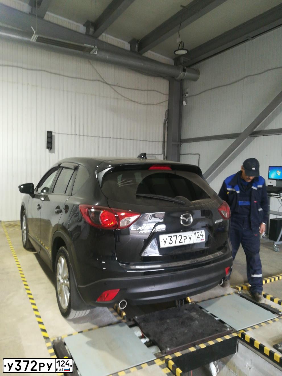 Фото автомобиля MAZDA CX-5, 2013 — госномер О157КУ138. Цвет: ЧЕРНЫЙ
