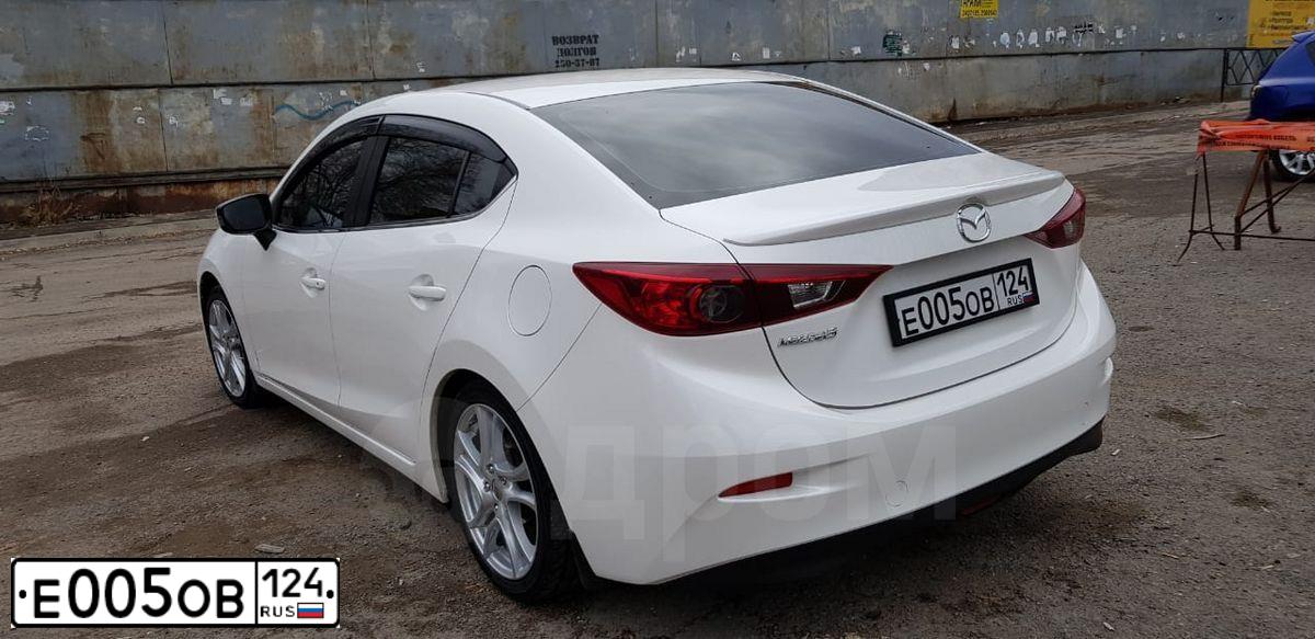 Фото автомобиля MAZDA 3, 2014 — госномер Е005ОВ124. Цвет: Белый