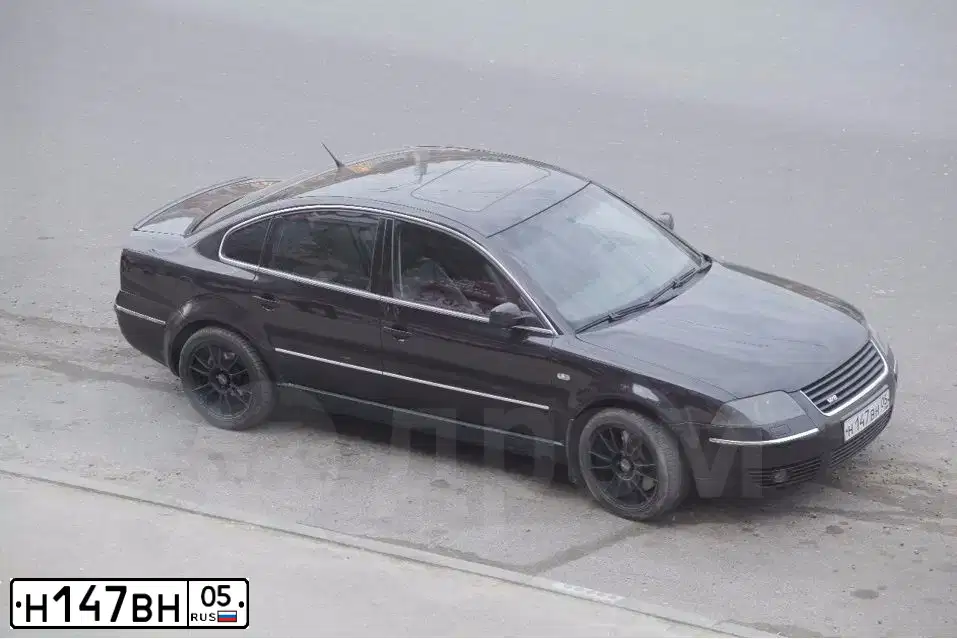 Фото автомобиля VOLKSWAGEN PASSAT, 2003 — госномер Н147ВН05. Цвет: ЧЕРНЫЙ