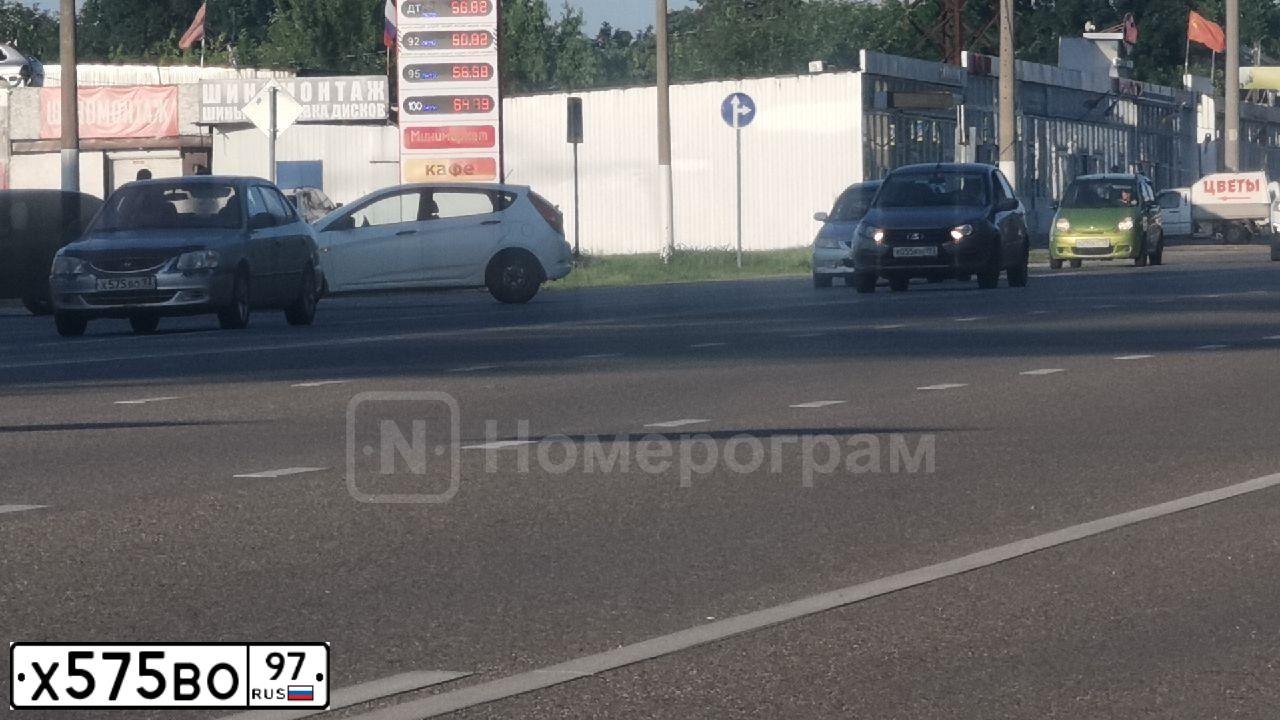 Фото автомобиля LADA 2111, 2003 — госномер Т082КА57. Цвет: Золотистый Красно-коричневый