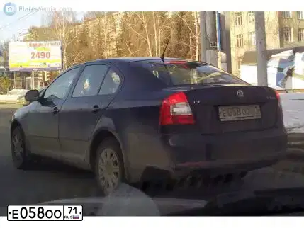 Фото автомобиля SKODA OCTAVIA, 2011 — госномер Е058ОО71. Цвет: ТЕМНО-СИНИЙ