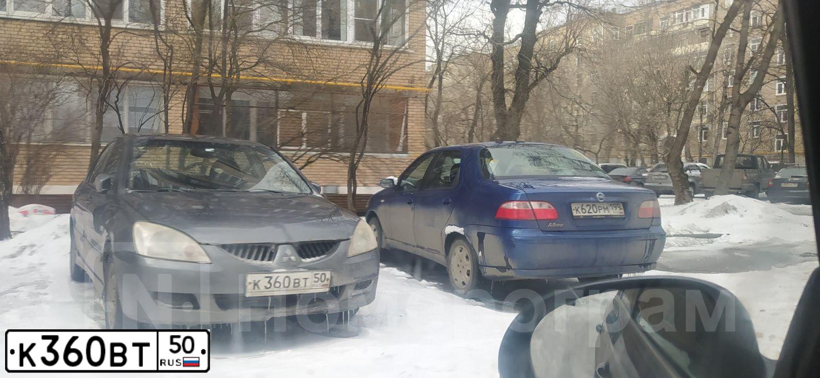 Фото автомобиля МИЦУБИСИ ЛАНСЕР 1.6, 2006 — госномер У446ЕЕ977. Цвет: СЕРЫЙ