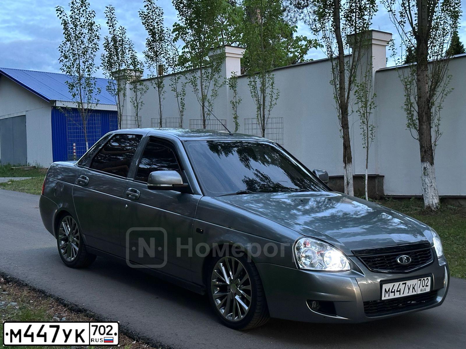 Фото автомобиля LADA 2170 PRIORA, 2012 — госномер А121НН702. Цвет: СРЕДНИЙ СЕРО-ЗЕЛЕН МЕТ