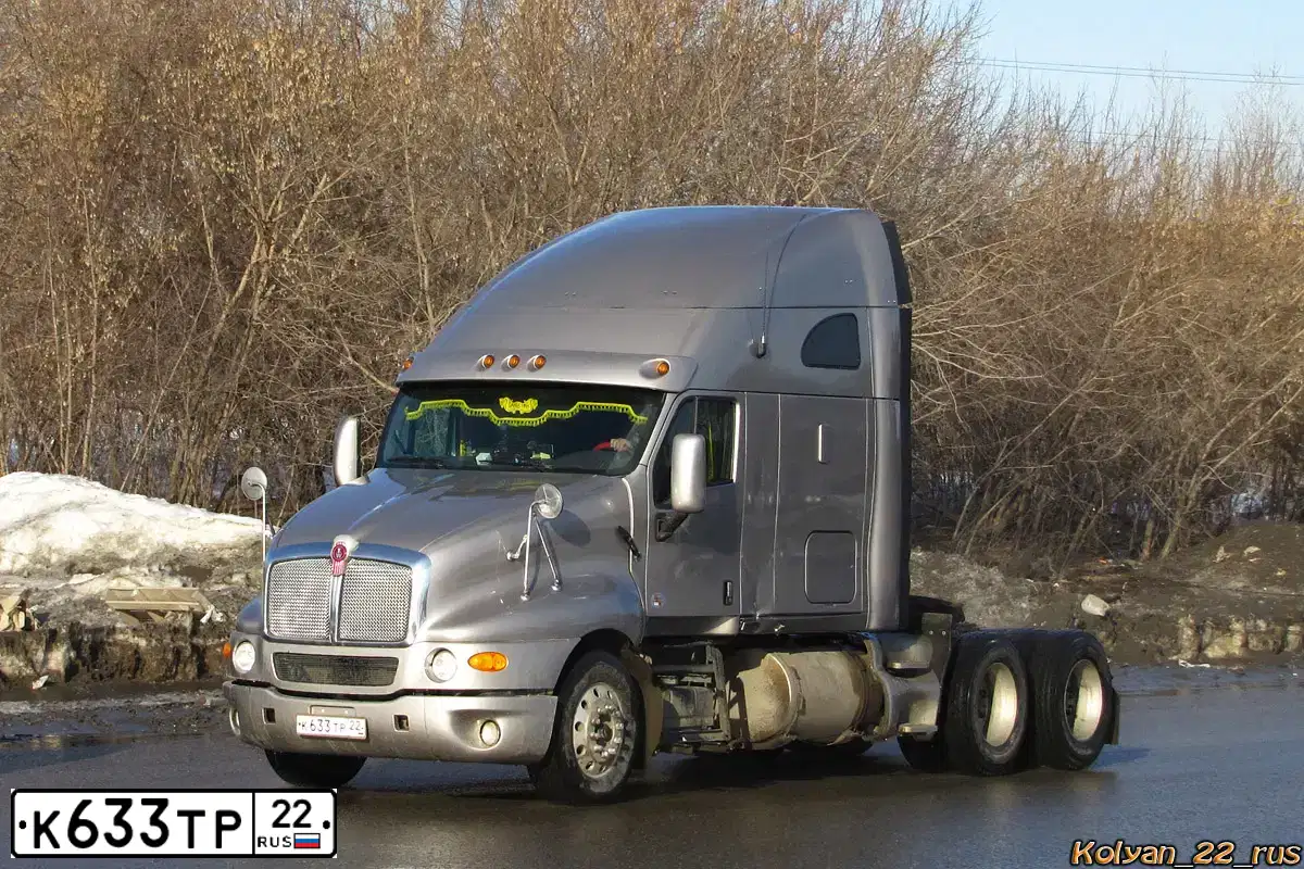 Фото автомобиля KENWORTH T-SERIE, 2009 — госномер К128ТЕ70. Цвет: Серый