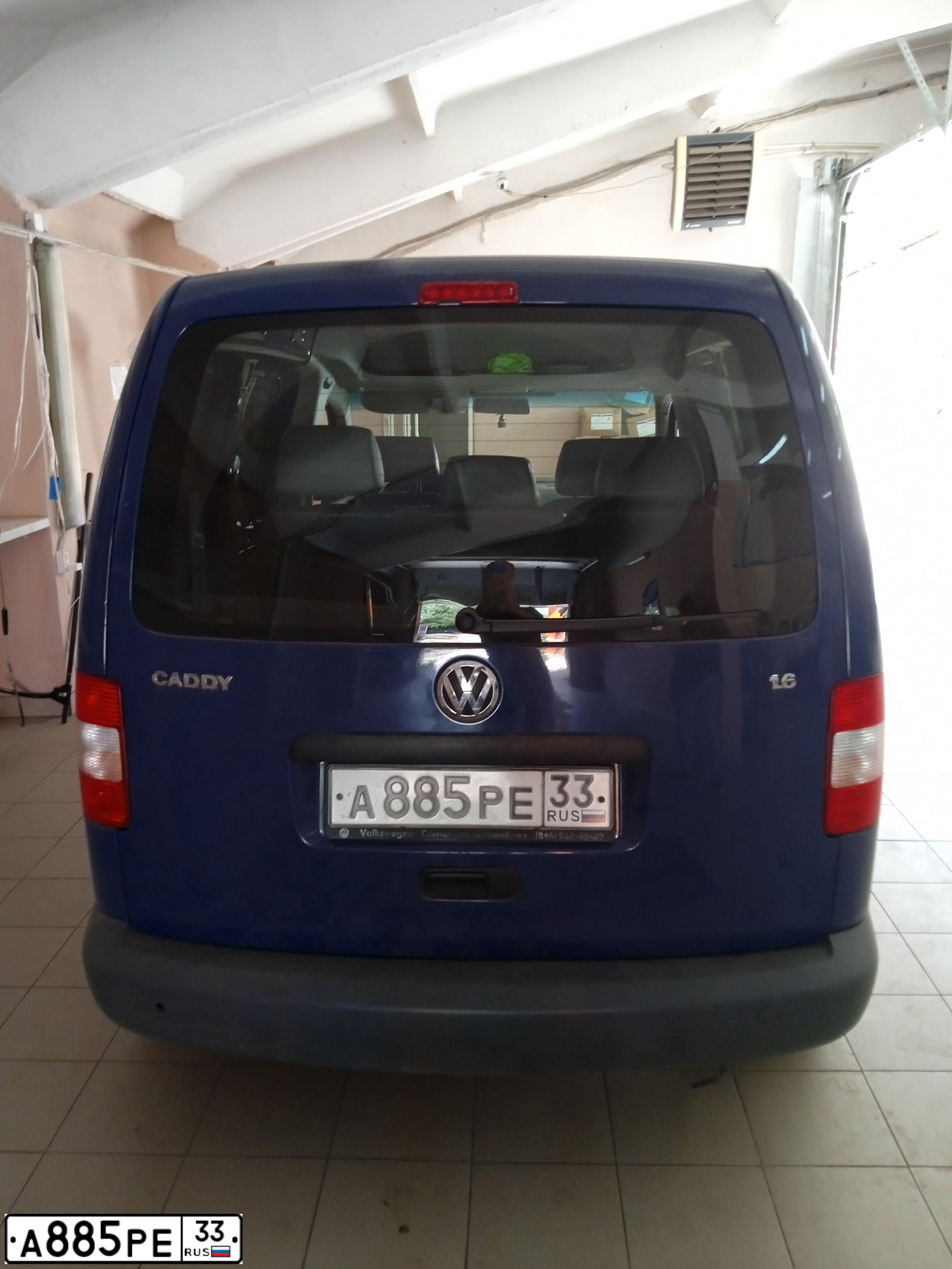 Фото автомобиля VOLKSWAGEN CADDY, 2009 — госномер А885РЕ33. Цвет: ТЕМНО-СИНИЙ