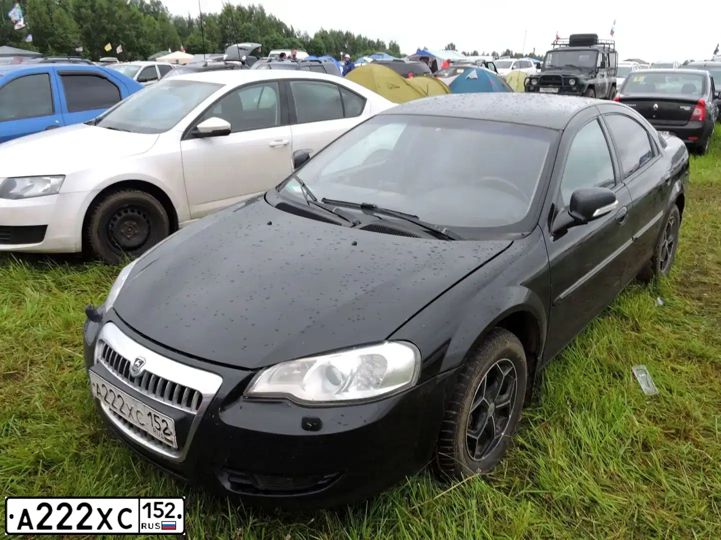 Фото автомобиля GAZ WOLGA SIBER, 2010 — госномер Х944НС152. Цвет: ЧЕРНЫЙ