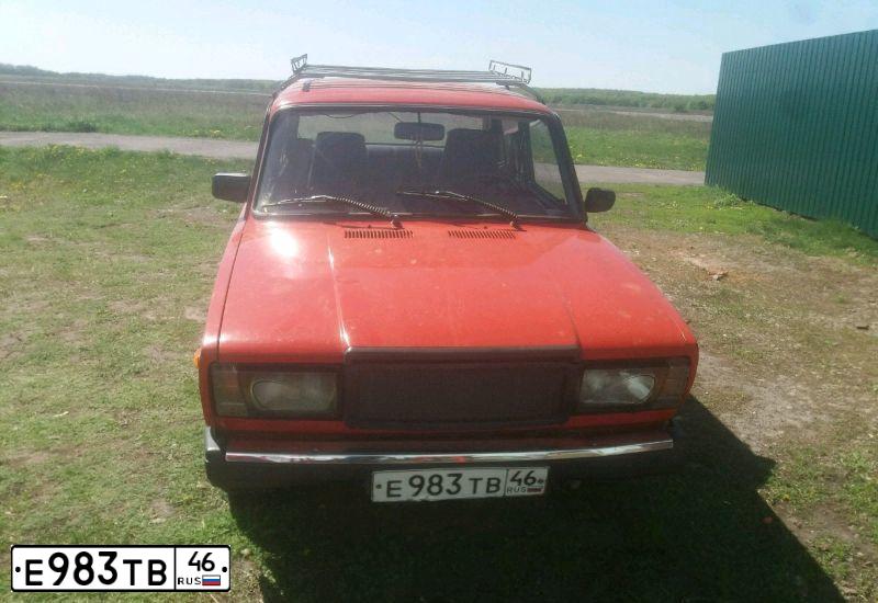 Фото автомобиля LADA 2107, 1991 — госномер Е983ТВ46. Цвет: Красный