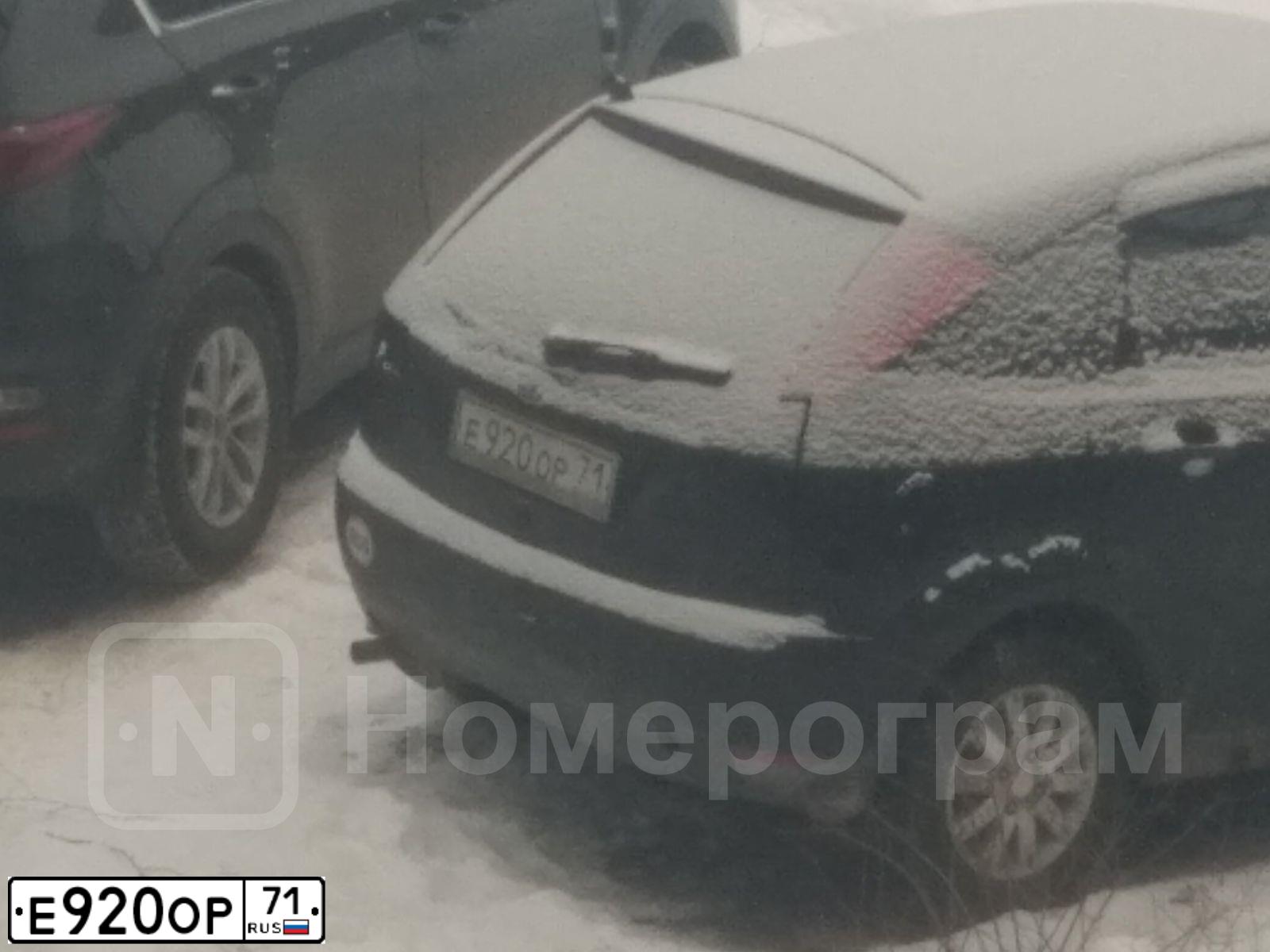Фото автомобиля FORD FOCUS, 1999 — госномер Е920ОР71. Цвет: ЧЕРНЫЙ МЕТАЛИК