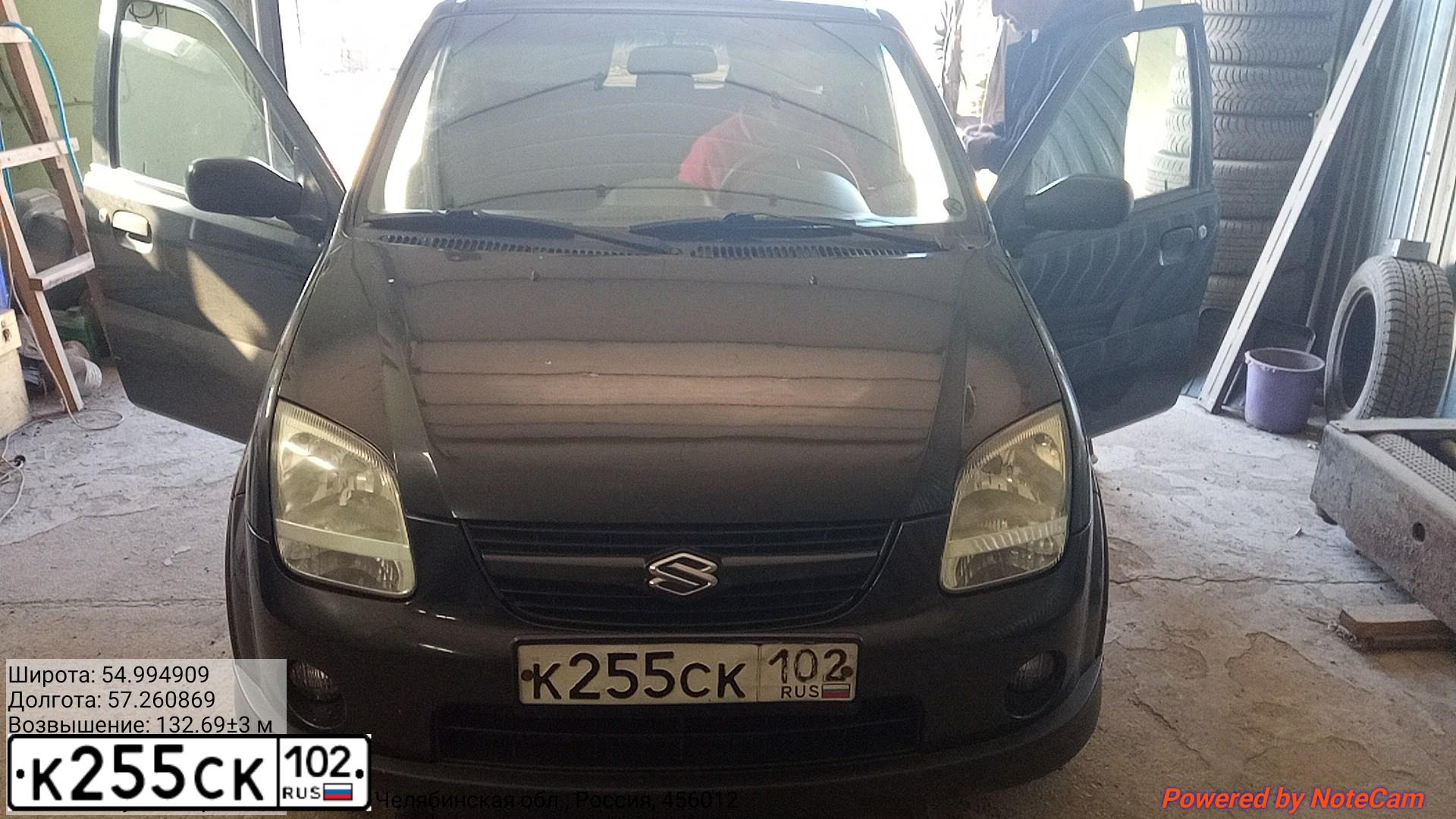 Фото автомобиля SUZUKI IGNIS, 2007 — госномер Х070АВ774. Цвет: ЧЕРНЫЙ
