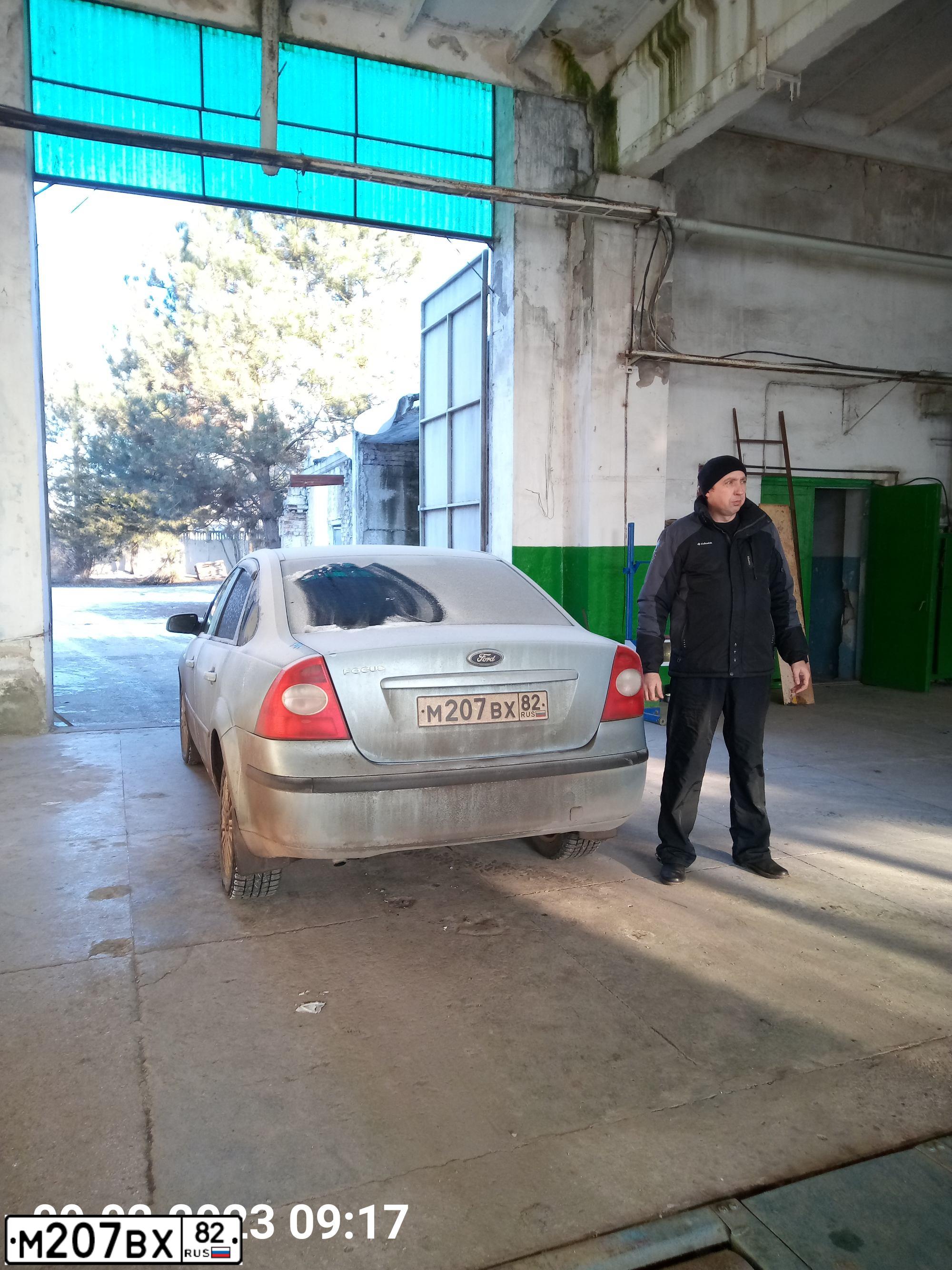 Фото автомобиля FORD FOCUS, 2006 — госномер М207ВХ82. Цвет: СВЕТЛО-СЕРО ГОЛУБОЙ