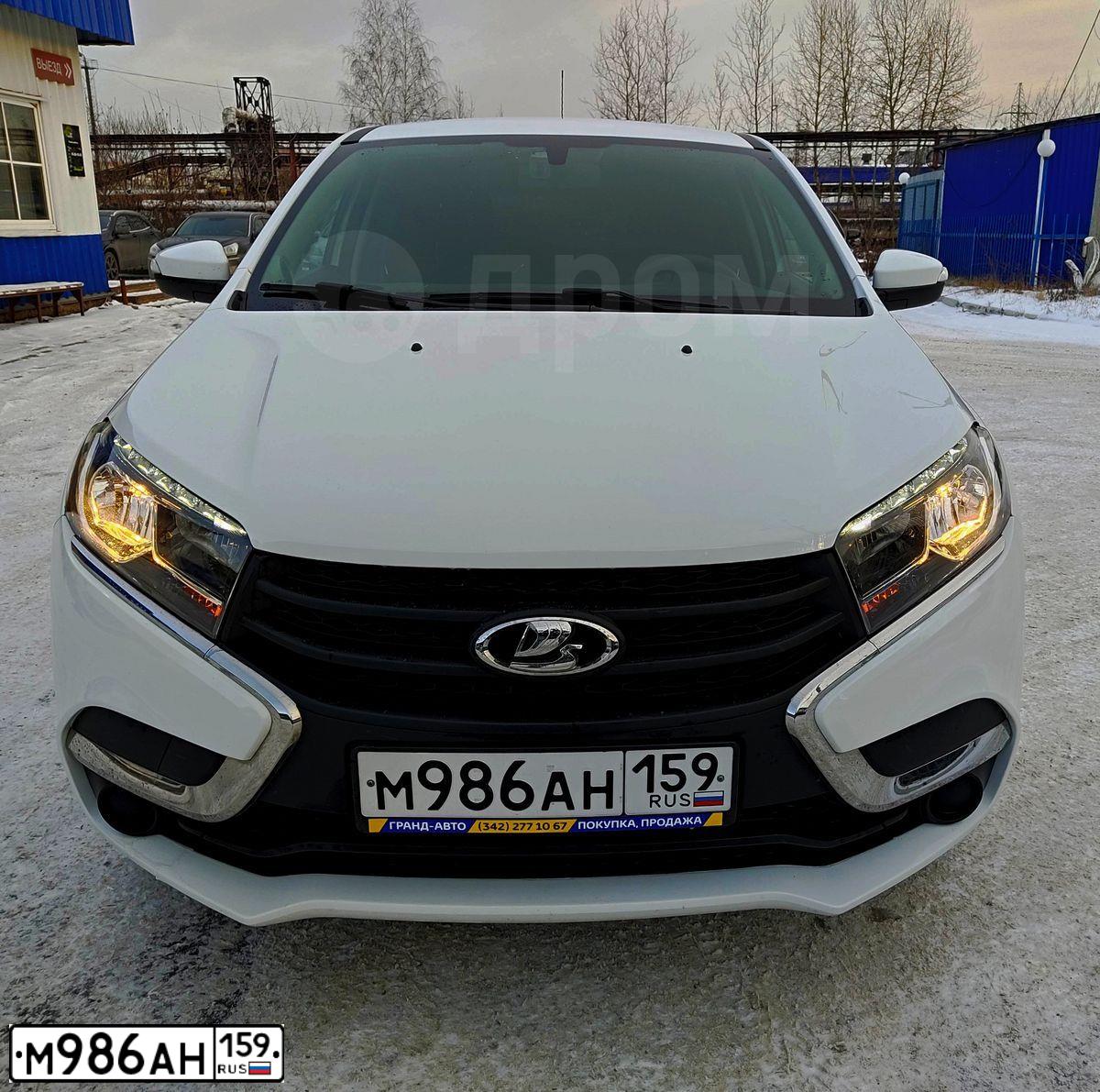 Фото автомобиля LADA XRAY, 2018 — госномер О433СХ159. Цвет: Белый