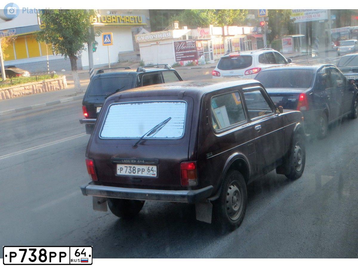 Фото автомобиля LADA 2121 NIVA, 2008 — госномер Р738РР64. Цвет: КРАСНЫЙ (ТЕМНО-ВИШНЕВЫЙ)