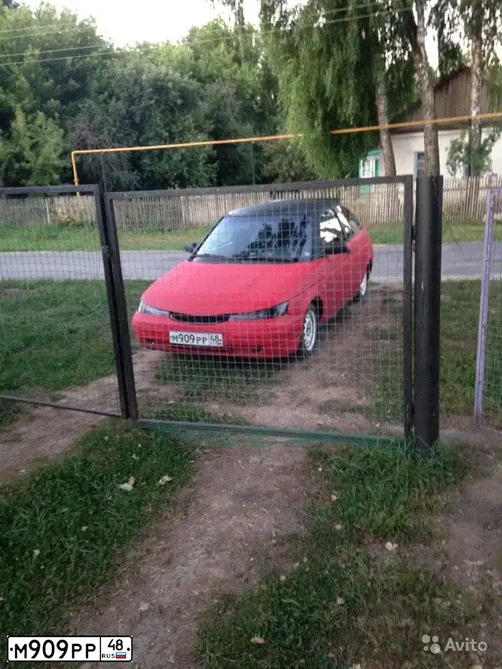 Фото автомобиля LADA 2112, 2007 — госномер Т123ТВ797. Цвет: КРАСНО-ЧЕРНЫЙ