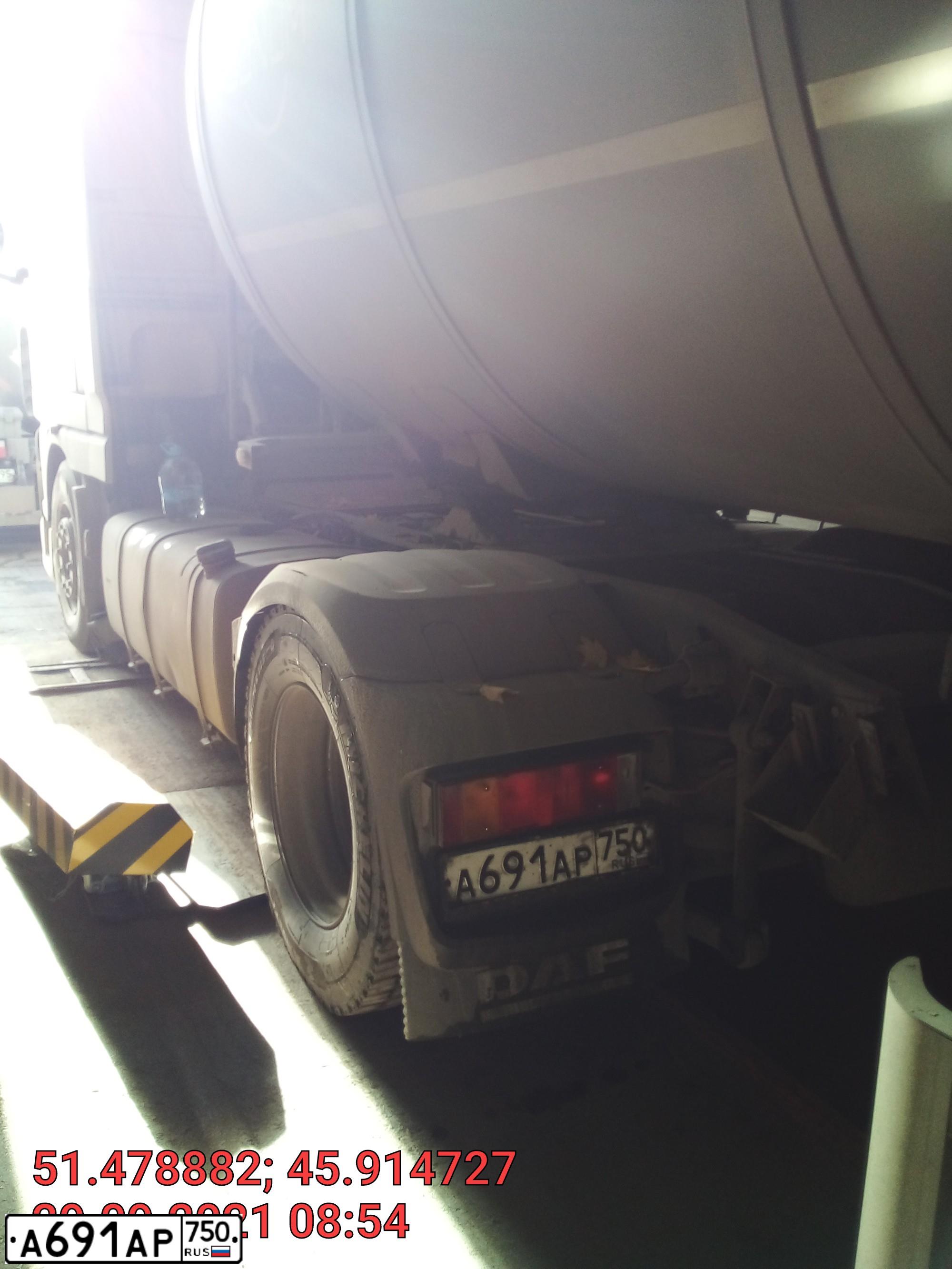 Фото автомобиля DAF XF 105 FT /4X2/, 2011 — госномер Т348МО05. Цвет: Белый