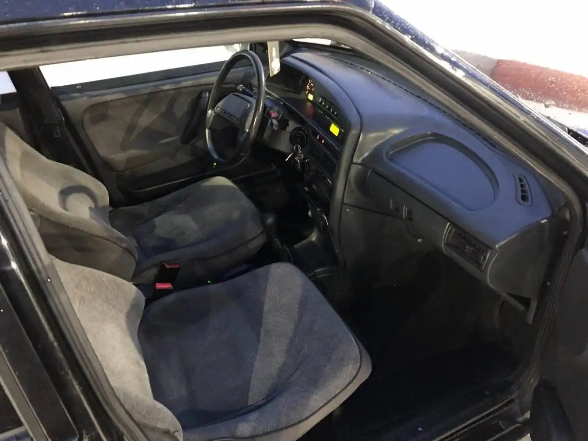 Фото автомобиля LADA 2115 SAMARA, 2009 — госномер Е057АС250. Цвет: СИНЕ-ЧЕРНЫЙ
