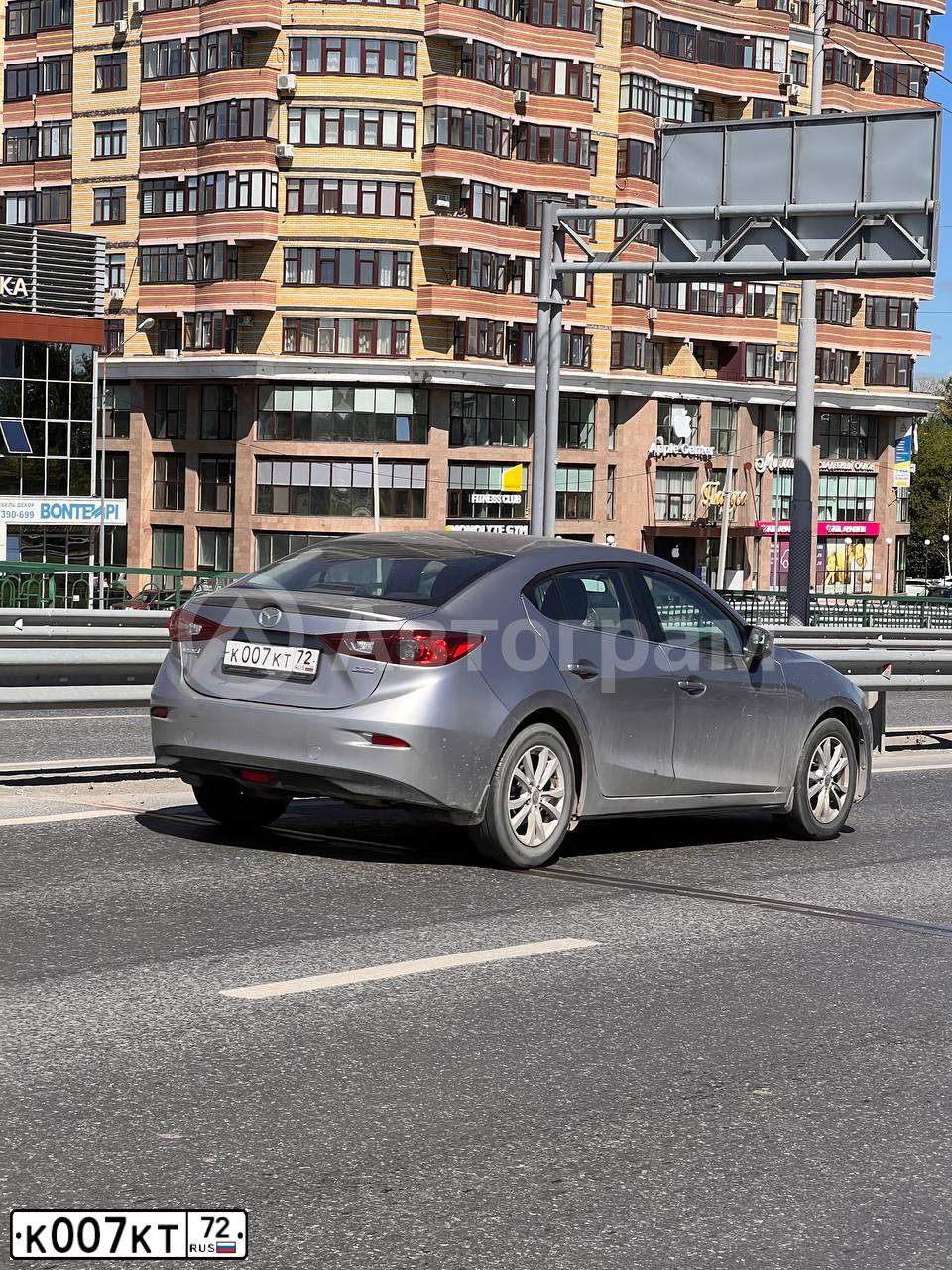 Фото автомобиля MAZDA 3, 2014 — госномер К007КТ72. Цвет: СЕРЕБРИСТЫЙ