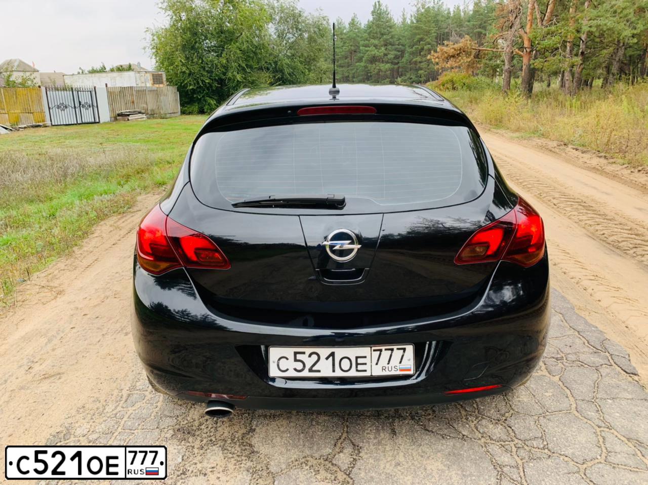 Фото автомобиля OPEL ASTRA, 2011 — госномер В065НН136. Цвет: ЧЕРНЫЙ