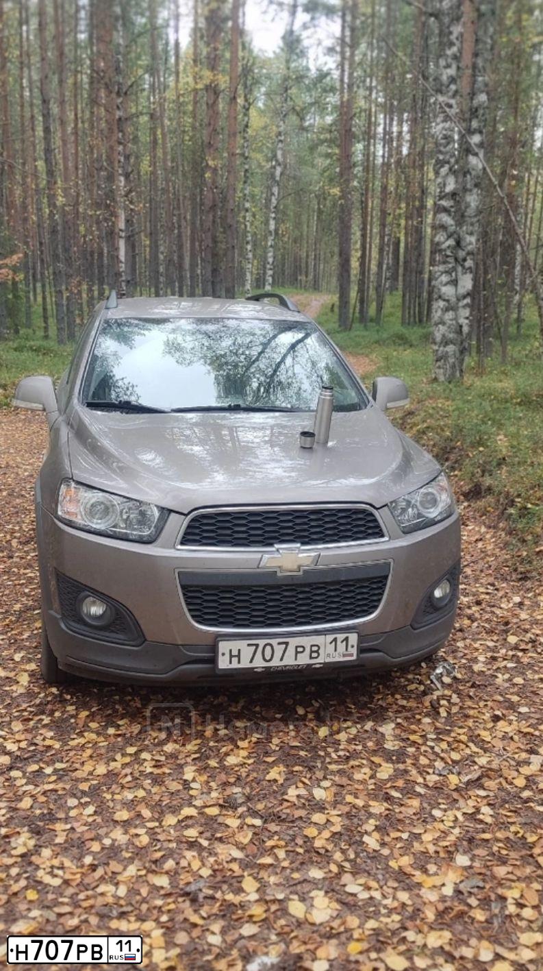 Фото автомобиля MITSUBISHI LANCER, 2006 — госномер Н003АХ11. Цвет: синий