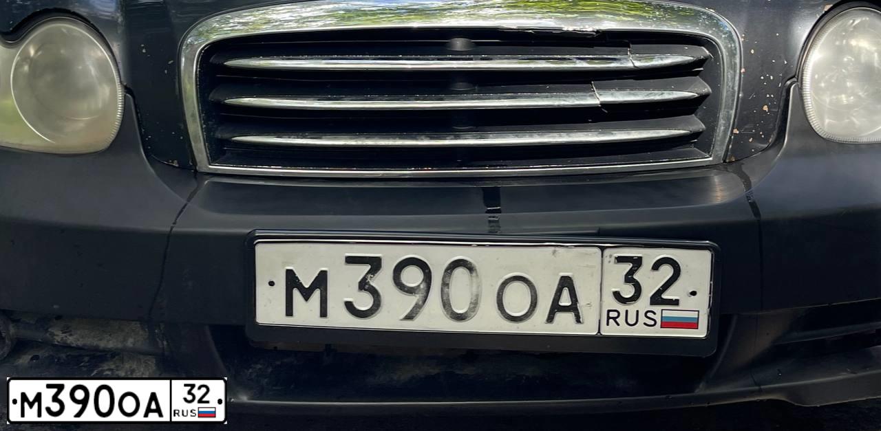 Фото автомобиля TAGAZ SONATA, 2007 — госномер М390ОА32. Цвет: ЧЕРНЫЙ