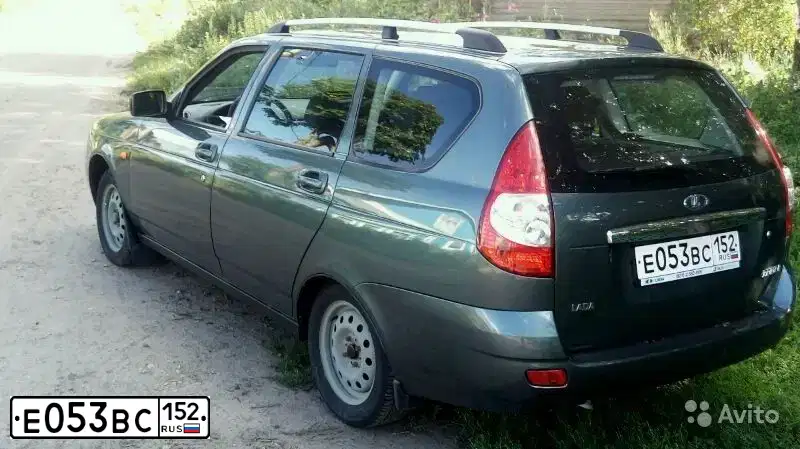 Фото автомобиля LADA 2171 PRIORA, 2011 — госномер Е053ВС152. Цвет: СЕРО-СИНЕ-ЗЕЛЕНЫЙ
