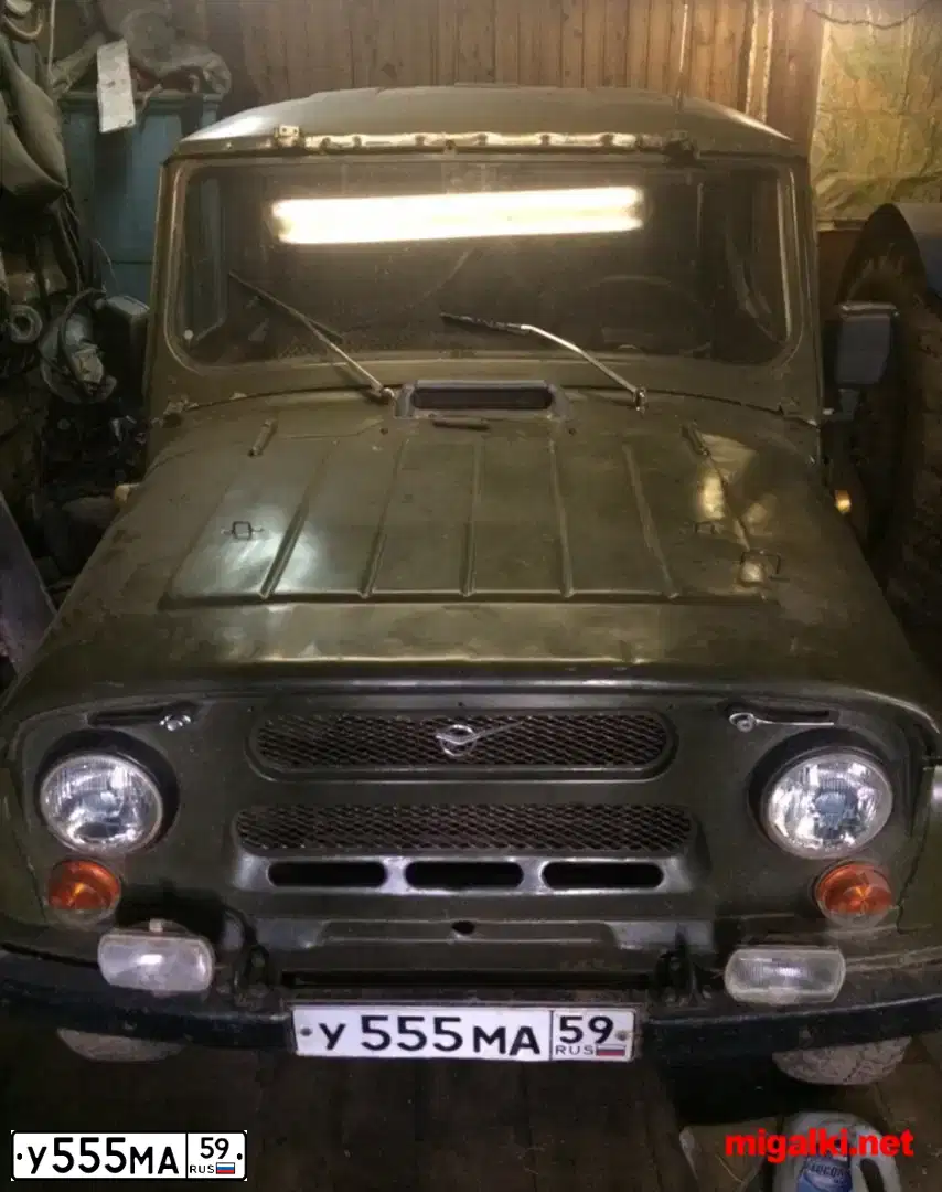 Фото автомобиля UAZ Z 3151  HUNTER, 1995 — госномер У555МА59. Цвет: ЗЕЛЕНЫЙ