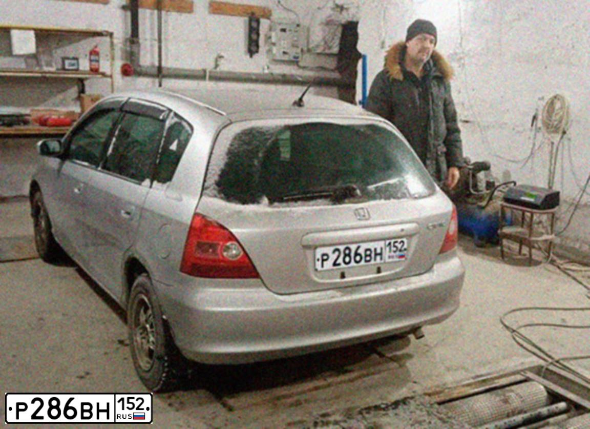 Фото автомобиля HONDA CIVIC, 2001 — госномер Р286ВН152. Цвет: СВЕТЛО-СЕРЫЙ