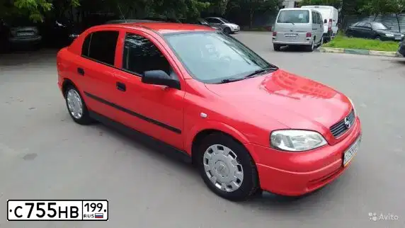 Фото автомобиля OPEL ASTRA, 2004 — госномер О210УУ97. Цвет: Красный