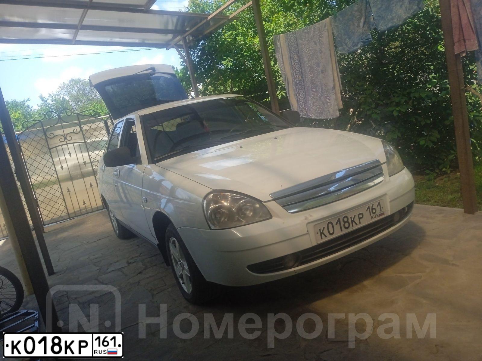 Фото автомобиля LADA 2172 PRIORA, 2010 — госномер К018КР161. Цвет: Белый