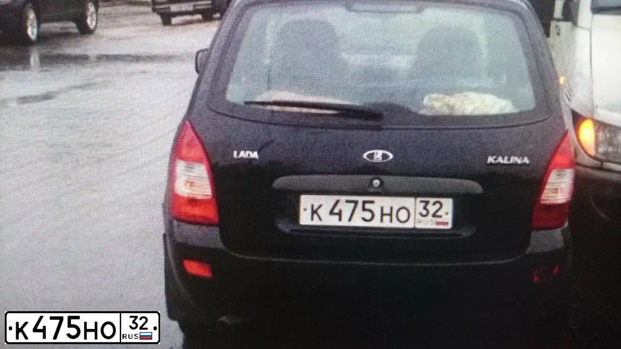 Фото автомобиля LADA 1117 KALINA, 2010 — госномер К475НО32. Цвет: СИНЕ-ЧЕРНЫЙ