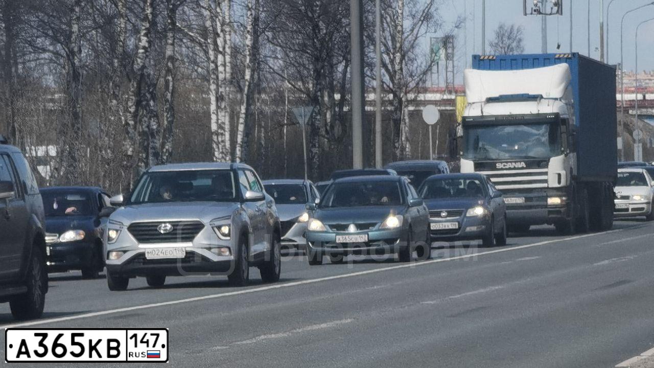 Фото автомобиля KIA RIO, 2010 — госномер А365КВ147. Цвет: ЧЕРНЫЙ