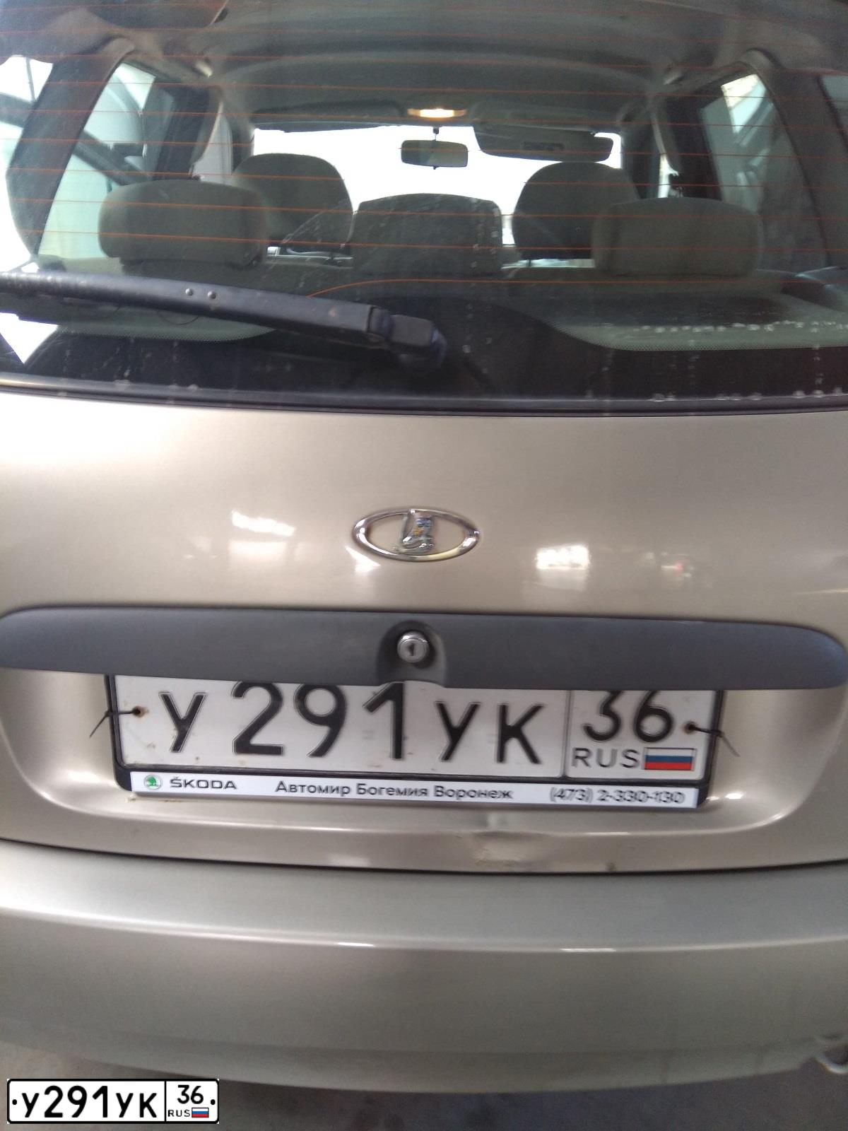 Фото автомобиля LADA 1117 KALINA, 2012 — госномер В822ЕК136. Цвет: СЕРО-БЕЖЕВЫЙ