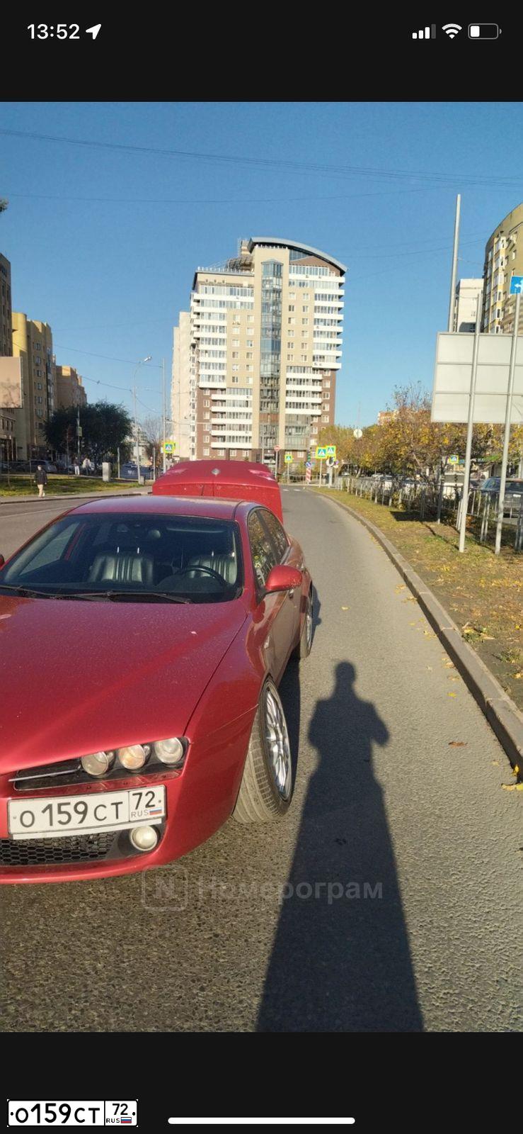 Фото автомобиля ALFAROMEO ALFA 159, 2007 — госномер О159СТ72. Цвет: Красный