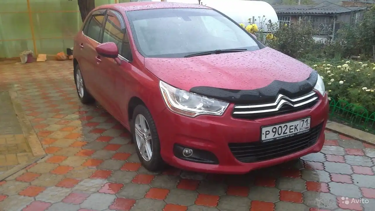 Фото автомобиля CITROEN C4, 2012 — госномер Р902ЕК71. Цвет: Красный