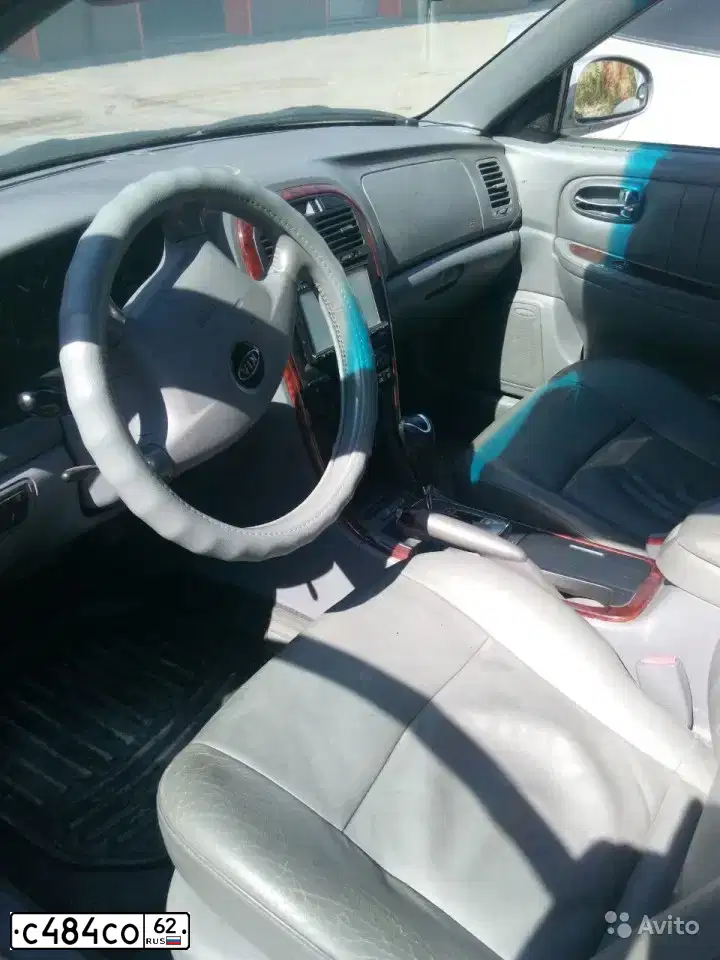 Фото автомобиля KIA MAGENTIS  OPTIMA, 2004 — госномер Р706ТТ62. Цвет: Серебристый