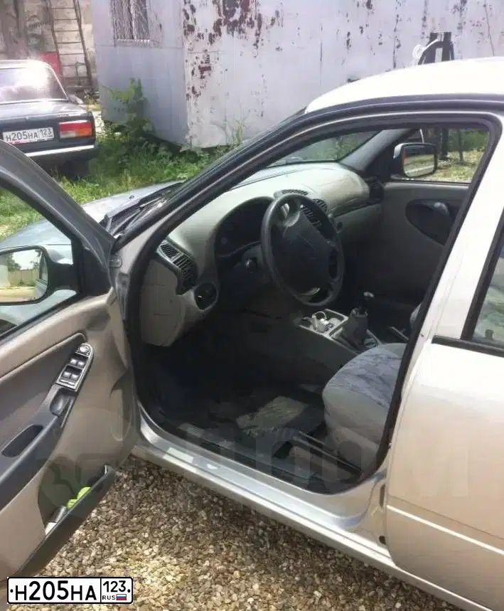 Фото автомобиля LADA 2107, 2007 — госномер Н205НА123. Цвет: Темно-зеленый