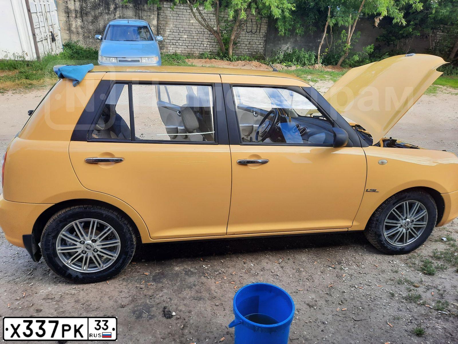Фото автомобиля LIFAN SMILY, 2011 — госномер Х337РК33. Цвет: ЖЁЛТЫЙ