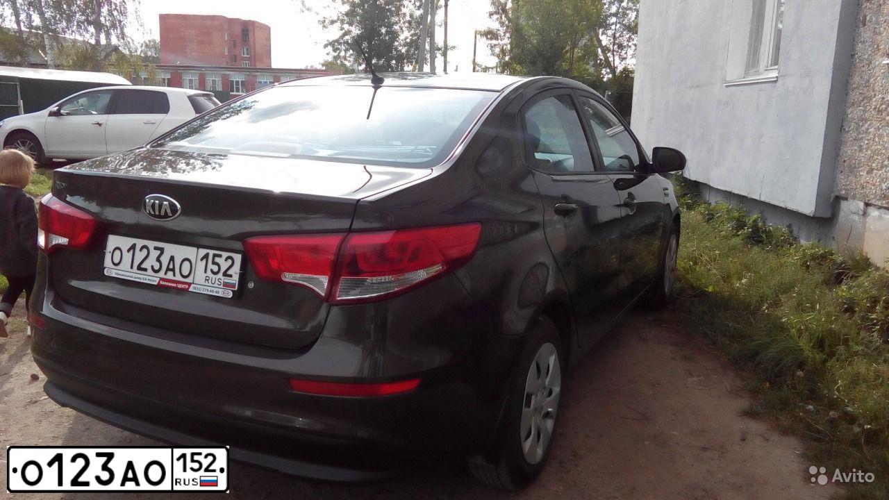 Фото автомобиля KIA RIO, 2015 — госномер О595ТО152. Цвет: Коричневый