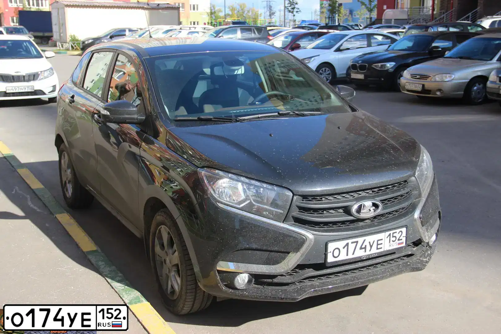 Фото автомобиля LADA XRAY, 2017 — госномер О174УЕ152. Цвет: ЧЕРНЫЙ