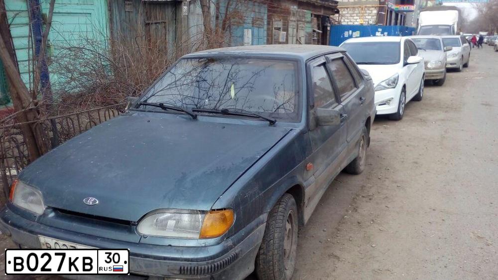 Фото автомобиля LADA 2115 SAMARA, 2001 — госномер В464МР30. Цвет: Темный серо-синий металлик