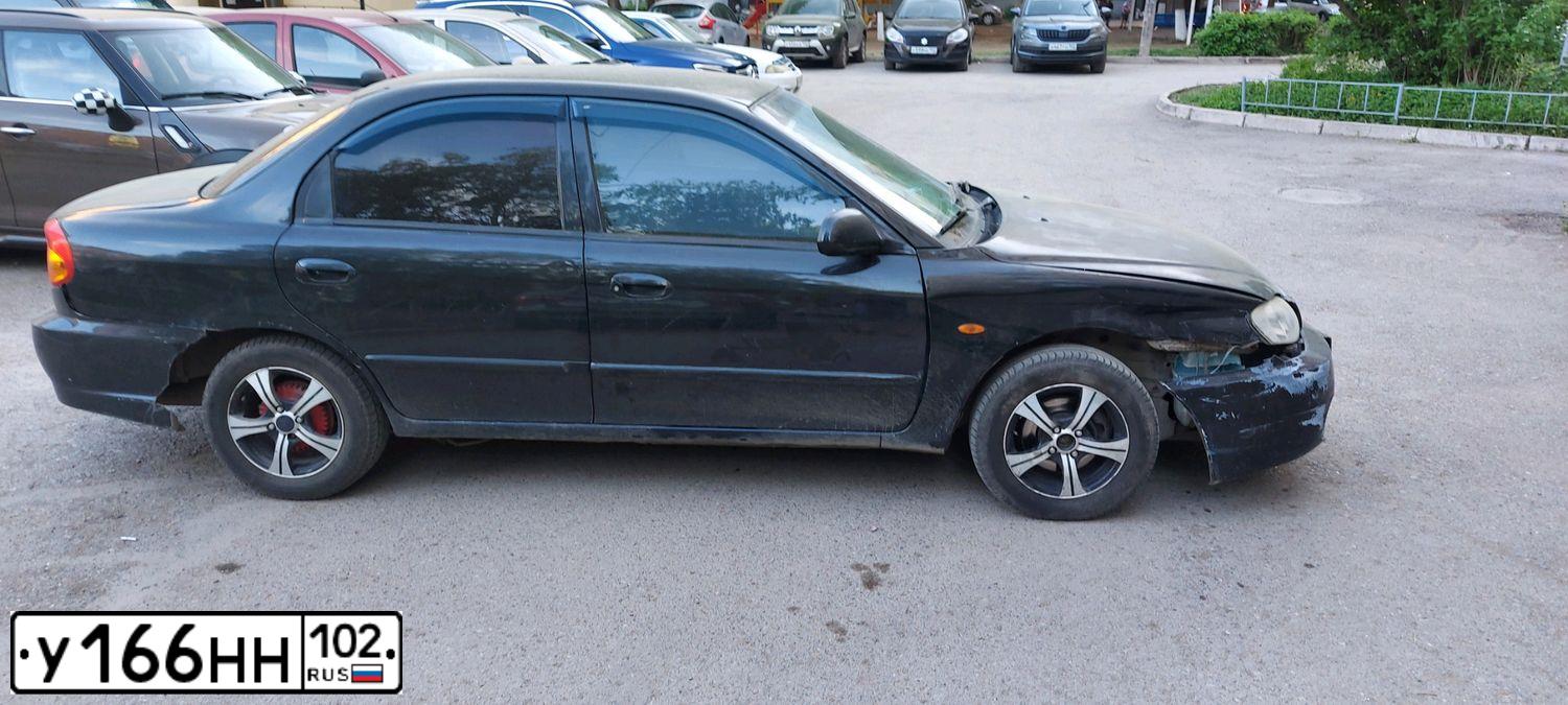 Фото автомобиля KIA SPECTRA, 2007 — госномер С456ЕН774. Цвет: ЧЕРНЫЙ