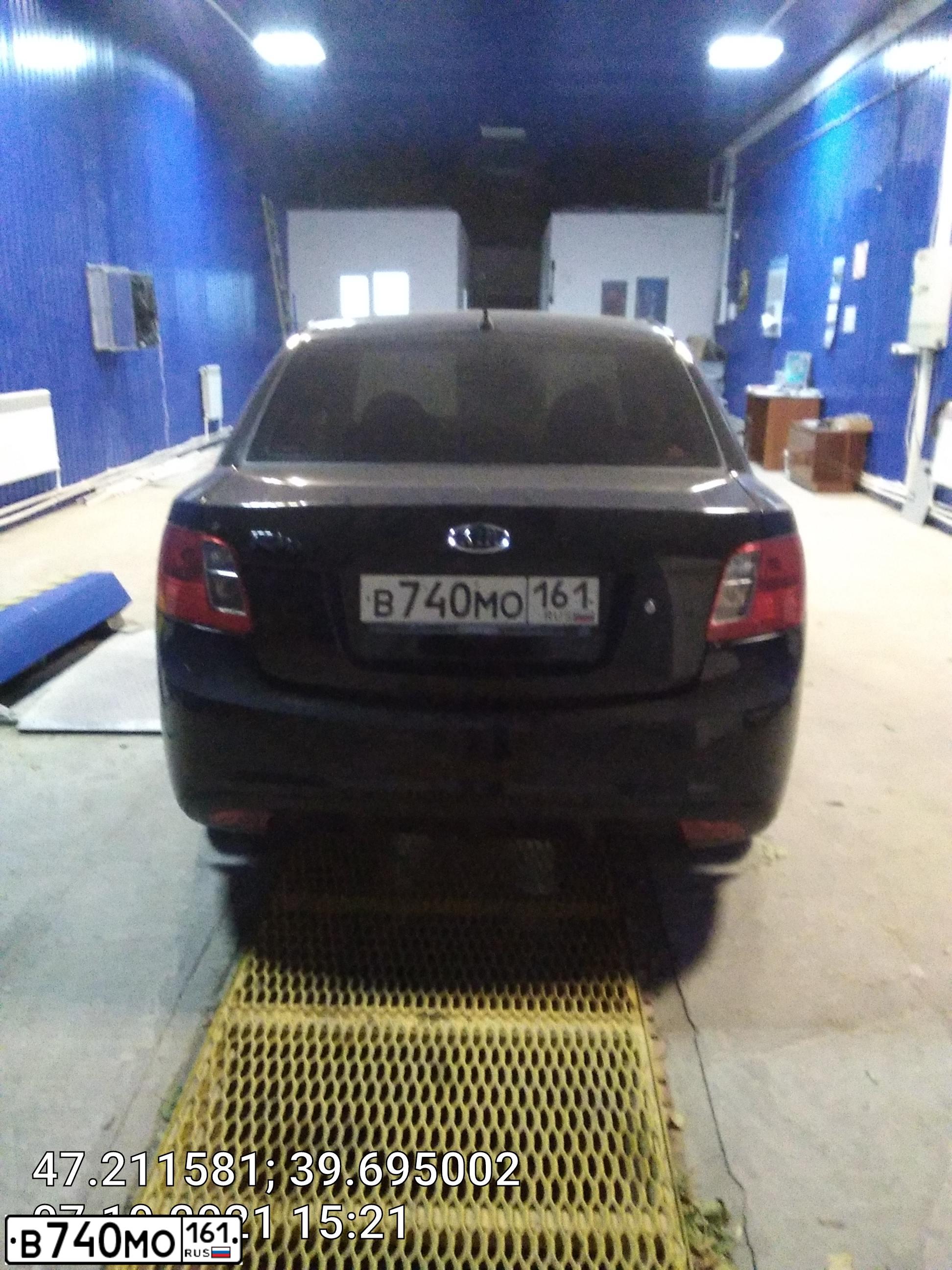 Фото автомобиля KIA RIO, 2010 — госномер В740МО161. Цвет: ЧЕРНЫЙ