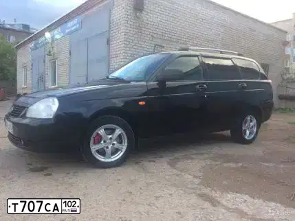 Фото автомобиля LADA 2171 PRIORA, 2011 — госномер Т707СА102. Цвет: Сине-Черный
