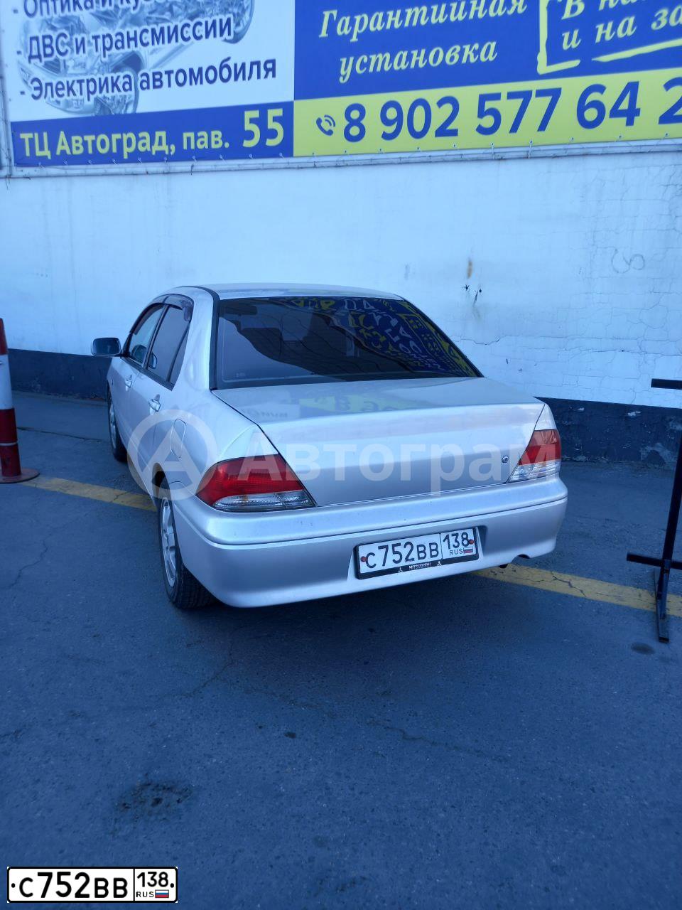 Фото автомобиля MITSUBISHI LANCER, 2004 — госномер С752ВВ138. Цвет: Серебристый